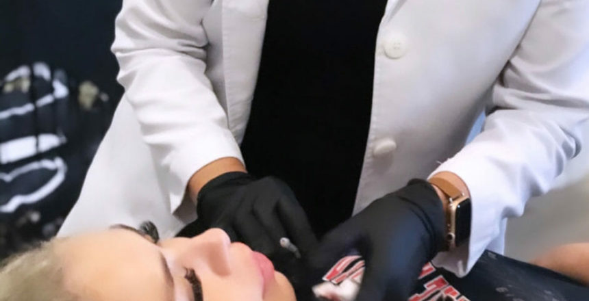 Leah Zawawi performs lip injections.